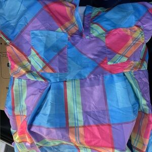 Vibrant Multicolor Plaid shirt it’s says 2xl but fits like a 1xl on me
